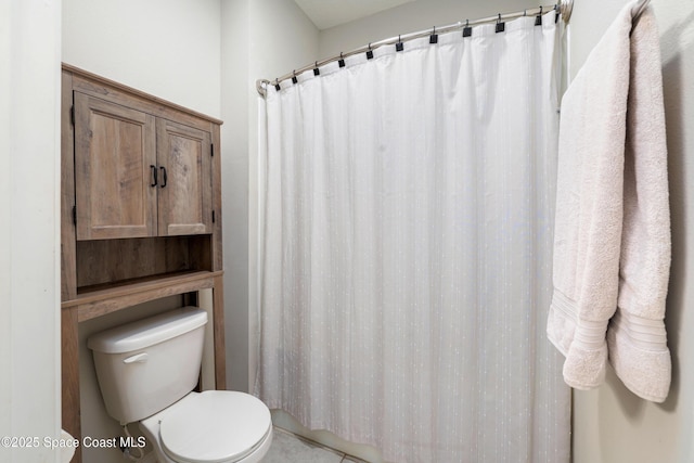 bathroom featuring toilet