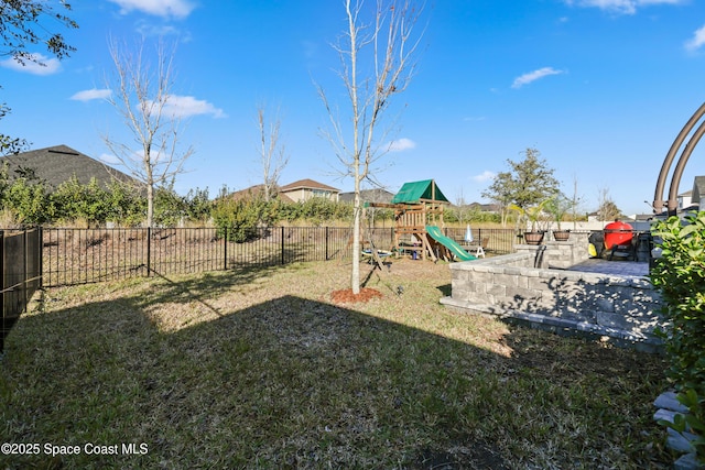 view of yard with a playground