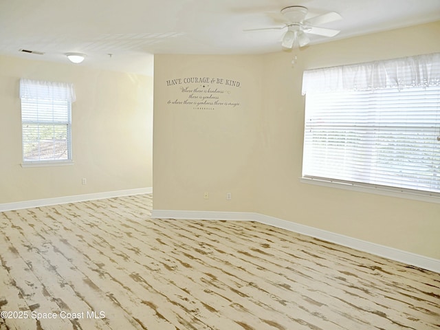 empty room featuring ceiling fan