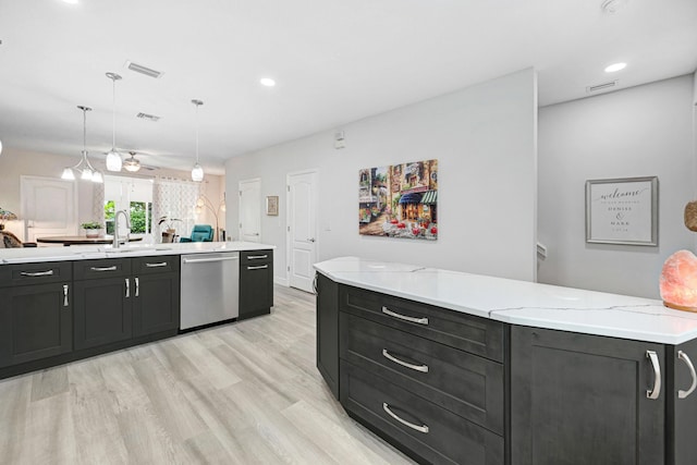 kitchen featuring dishwasher, light hardwood / wood-style floors, ceiling fan, sink, and decorative light fixtures