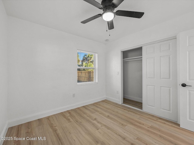 unfurnished bedroom with a closet, ceiling fan, and light hardwood / wood-style floors