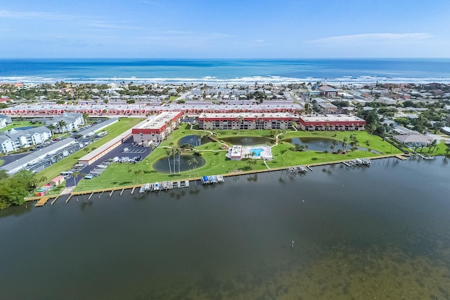 drone / aerial view featuring a water view