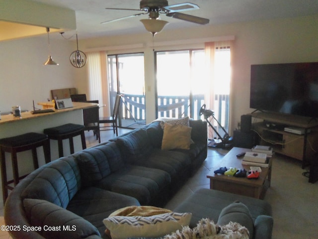 living room with ceiling fan