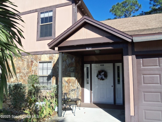 property entrance featuring a garage