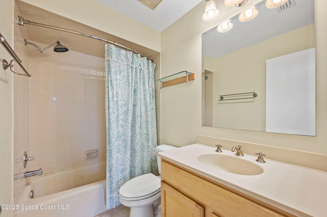 full bathroom with tile patterned floors, toilet, vanity, and shower / bath combo