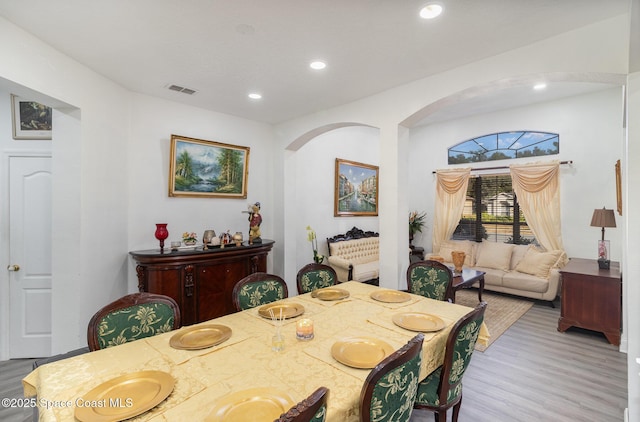 dining space featuring hardwood / wood-style flooring