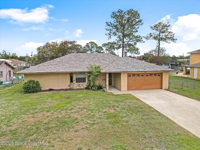 single story home featuring a front yard and a garage