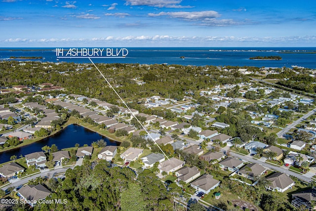 drone / aerial view featuring a water view