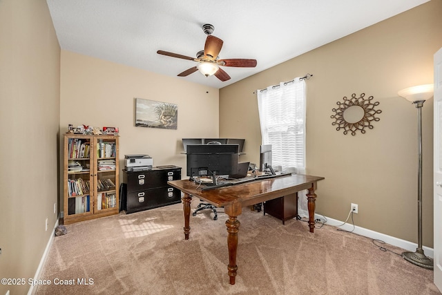 office featuring ceiling fan and carpet