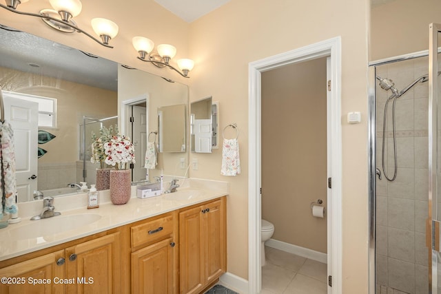 full bathroom featuring tile patterned flooring, vanity, toilet, and independent shower and bath