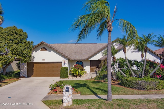 single story home with a garage