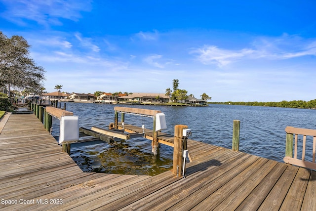 dock area featuring a water view