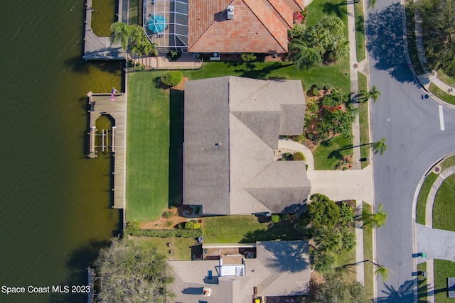 bird's eye view with a water view