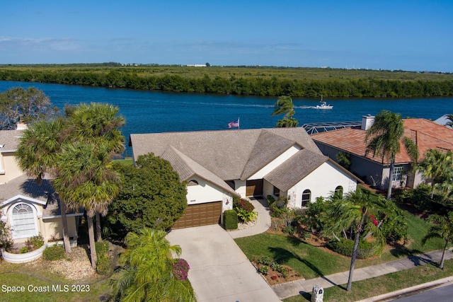 drone / aerial view with a water view