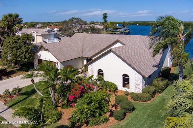 drone / aerial view featuring a water view