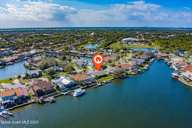 birds eye view of property featuring a water view