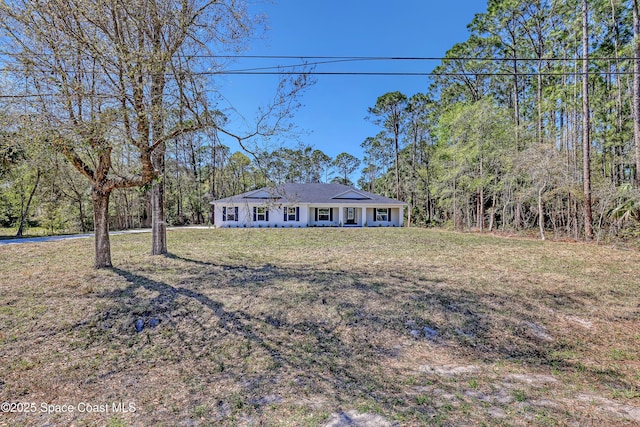 view of front of house with a front lawn