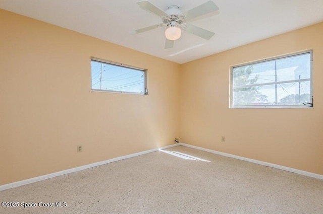 unfurnished room featuring ceiling fan