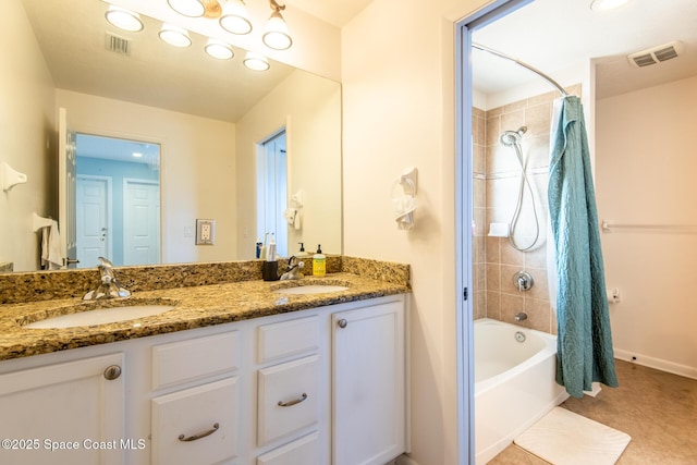 bathroom featuring tile patterned floors, vanity, and shower / bathtub combination with curtain