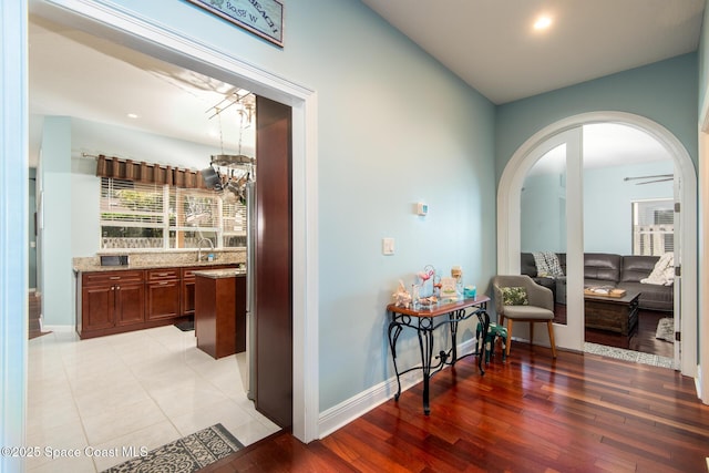 corridor featuring light hardwood / wood-style flooring