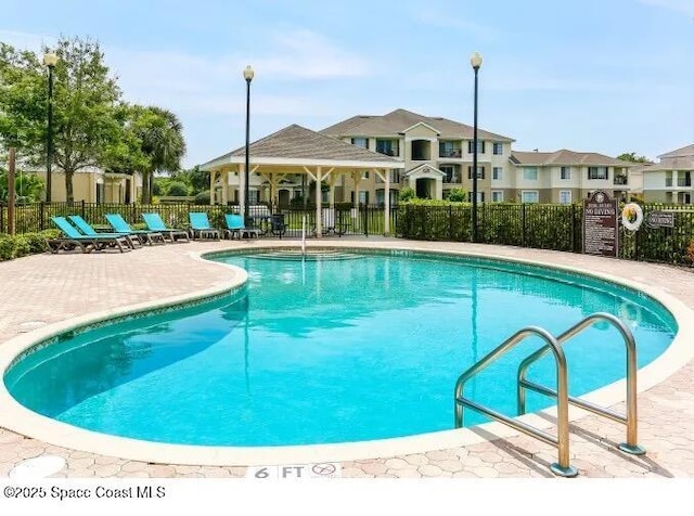 view of pool with a patio area