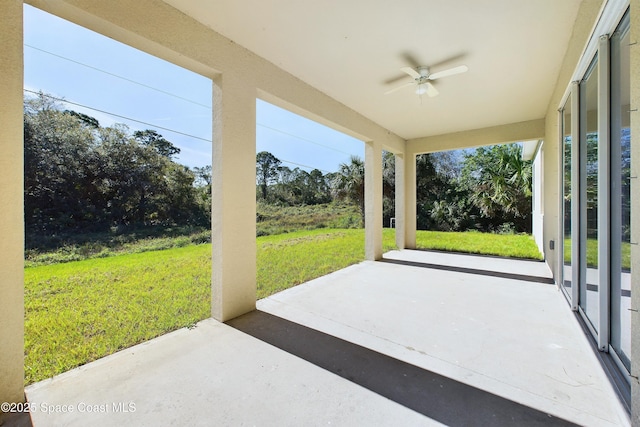 view of patio featuring ceiling fan