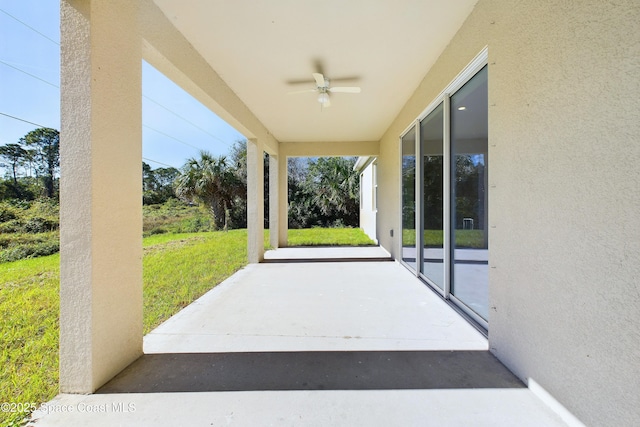 view of patio with ceiling fan