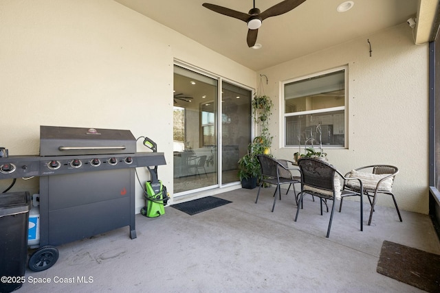 view of patio / terrace featuring grilling area and ceiling fan