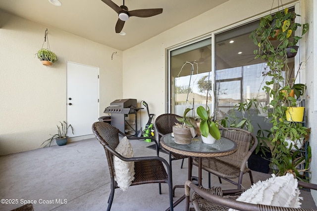 view of patio / terrace with a grill and ceiling fan