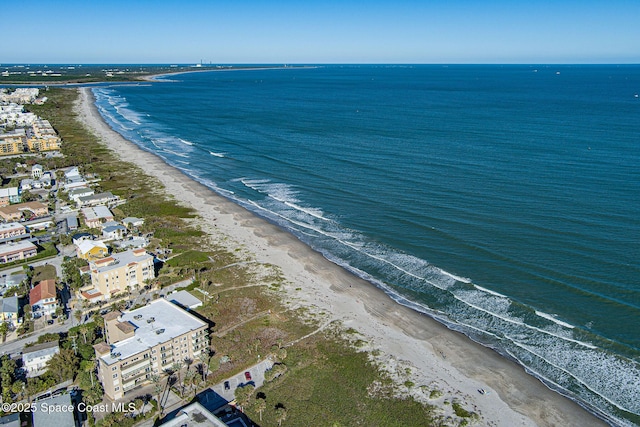 bird's eye view featuring a beach view and a water view