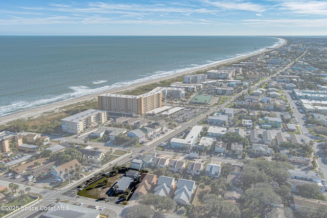 aerial view featuring a water view and a view of the beach