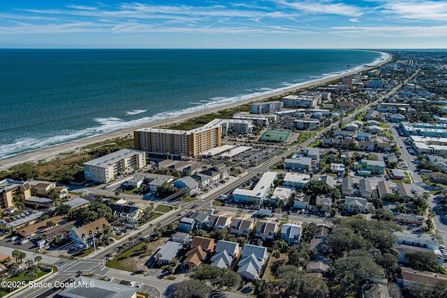 aerial view featuring a water view and a view of the beach