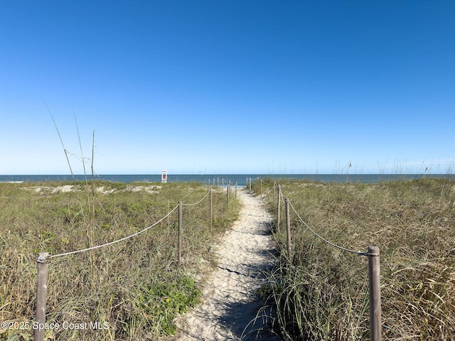 property view of water with a beach view