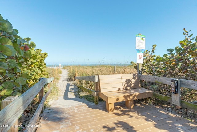 dock area with a water view