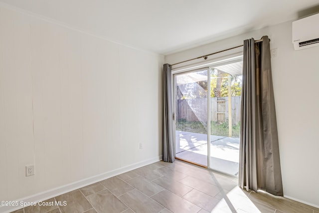 empty room featuring an AC wall unit