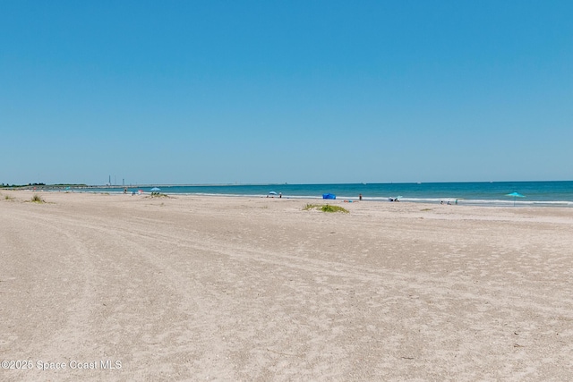 property view of water featuring a view of the beach