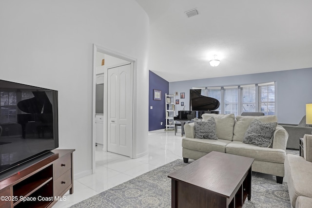 living room with light tile patterned floors