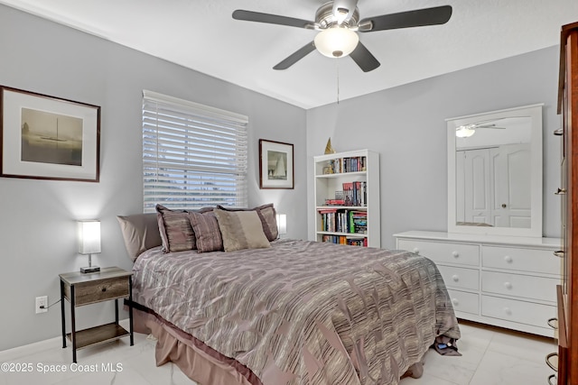 bedroom featuring ceiling fan