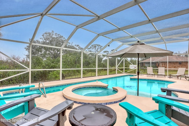 view of swimming pool featuring an in ground hot tub, a patio area, and glass enclosure