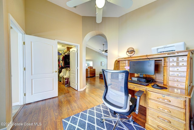 office space with wood-type flooring