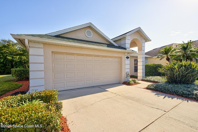 ranch-style home featuring a garage