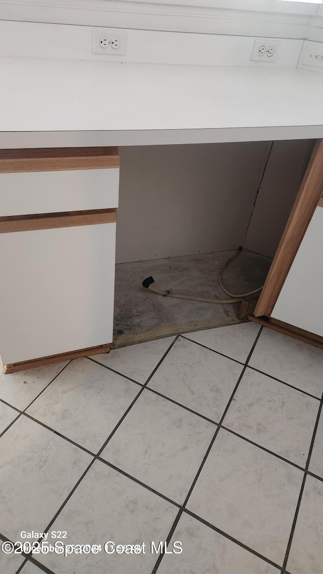 bathroom with tile patterned flooring