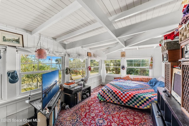 bedroom with beamed ceiling