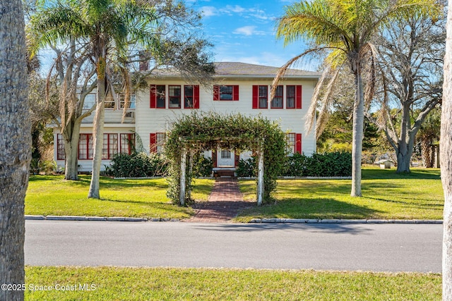 view of front of property with a front yard