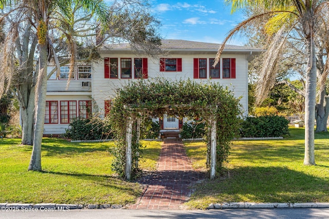 view of front of home with a front lawn