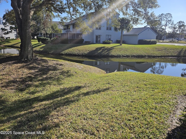 view of yard with a water view