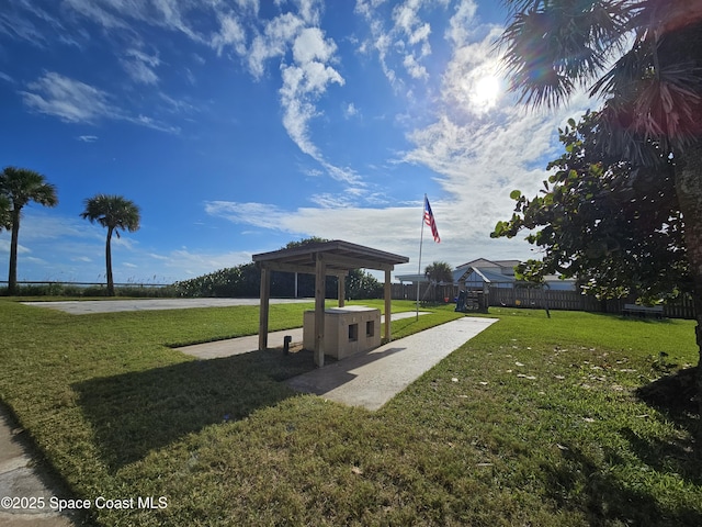 view of community featuring a gazebo and a lawn