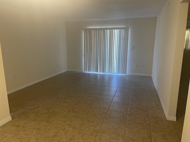 view of tiled empty room