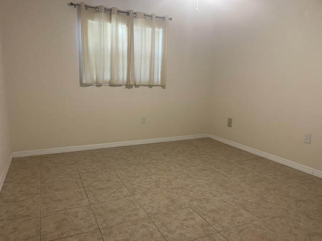 view of tiled spare room