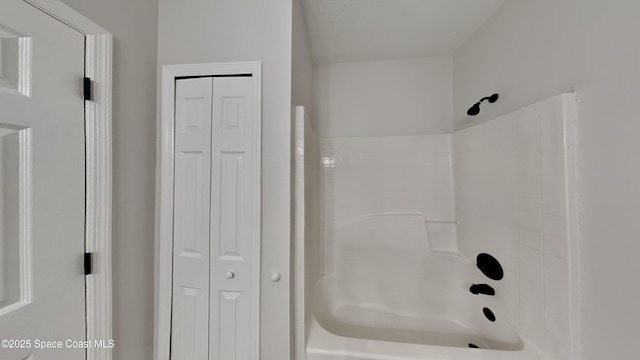 bathroom with shower / tub combination